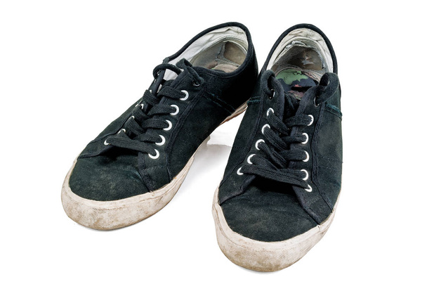 старі брудні кросівки ізольовані на білому
 - Фото, зображення
