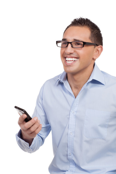 Laughing man holding a mobile phone - Foto, afbeelding