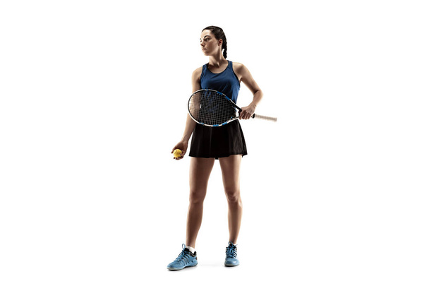 Full length portrait of young woman playing tennis isolated on white background - Φωτογραφία, εικόνα