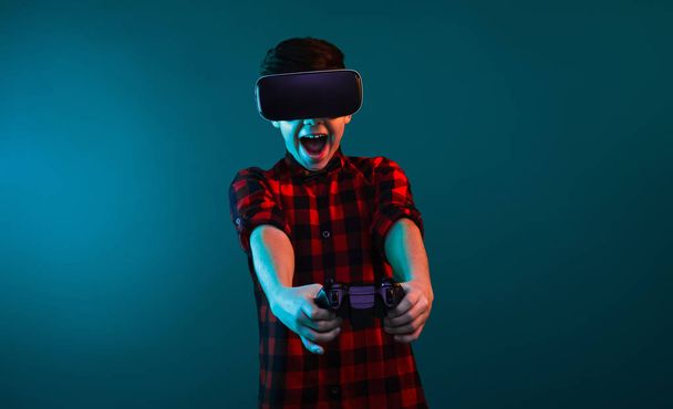 Excited boy playing VR game - Фото, зображення