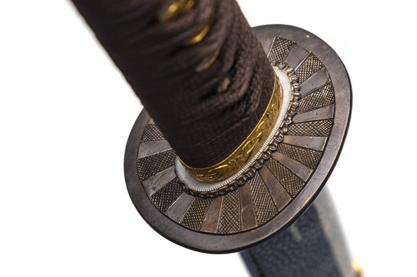Tsuba : hand guard of Japanese sword made of steel  isolated in white background.  Selective focus. - 写真・画像