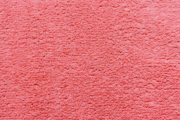 coral soft fleece texture. The surface of a teddy microfiber rug - Photo, Image