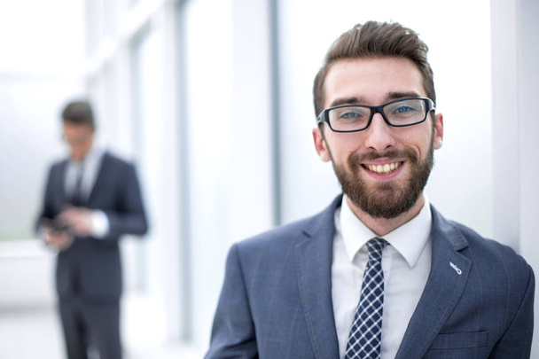 close up.businessman with glasses on the background of the office - Foto, Imagen