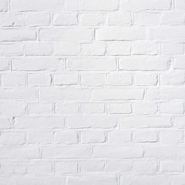 αποτελείται από τετράγωνο τμήμα του τοίχου λευκά ασβεστωμένα τούβλα παρασκήνιο - Φωτογραφία, εικόνα