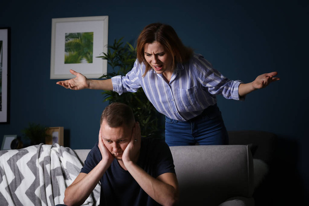 Unhappy couple having argument at home. Concept of divorce - Foto, Imagen