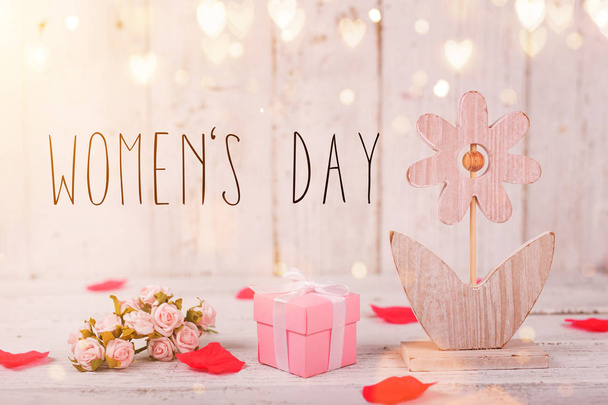 Flowers composition for Womens Day. Pink flowers on old white wooden background. - Fotó, kép