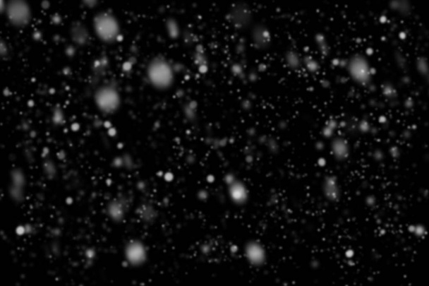 Havazás, a fekete háttér. Hó bokeh textúra. - Fotó, kép