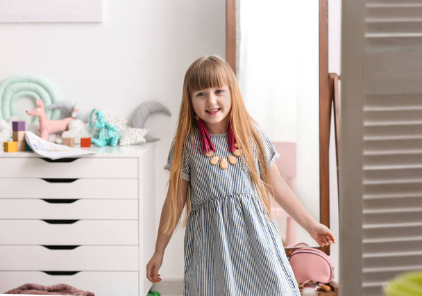 Portrait of cute little fashionista at home - Photo, Image