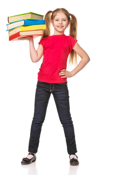 Girl holding stack color books. Isolated - Фото, зображення