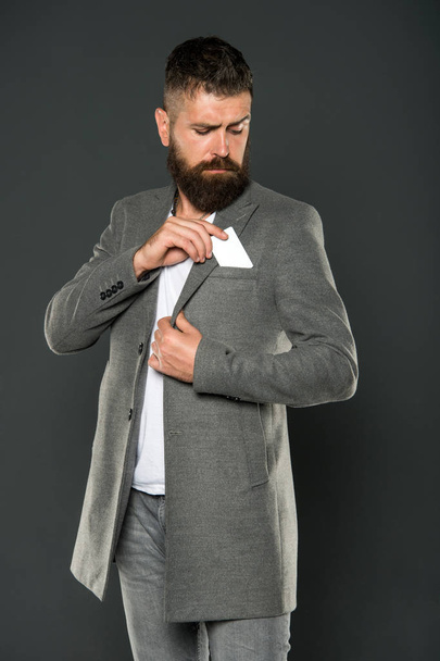 Businessman with credit card. Brutal man with hipster beard. confident businessman in suit. Business fashion and dress code. Bearded man. Male formal fashion. Mature. Earn money easy business tips - Foto, imagen