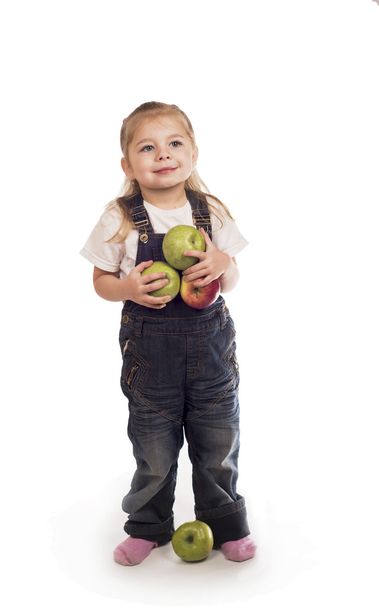 The little girl plays with apples - Fotó, kép