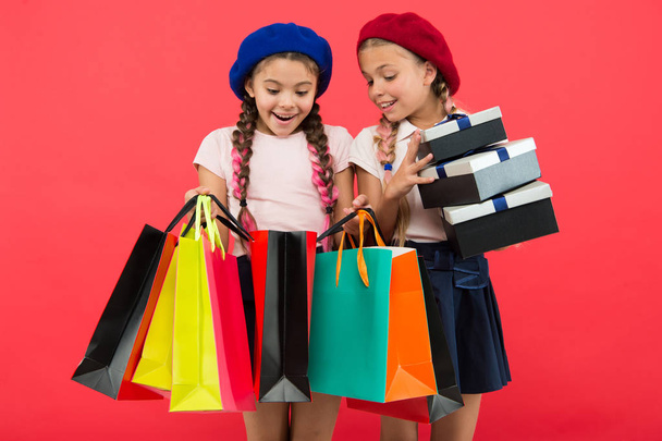 friendship and sisterhood. International childrens day. Birthday and christmas presents. small girl children with shopping bags. big sale in shopping mall. Happy shopping online. After shopping - Φωτογραφία, εικόνα