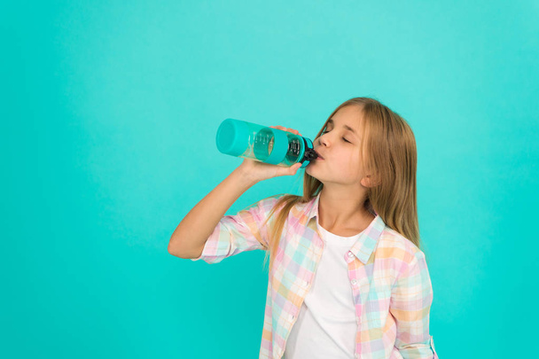International childrens day. Childhood happiness. Happy little girl. Beauty and fashion. small kid fashion. small girl child with perfect hair. feeling thirsty. kid drink water. Fresh funky beauty - Foto, Bild