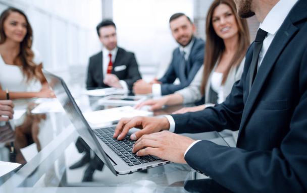 Businessman using laptop during a meeting of the Board of Directors - Φωτογραφία, εικόνα