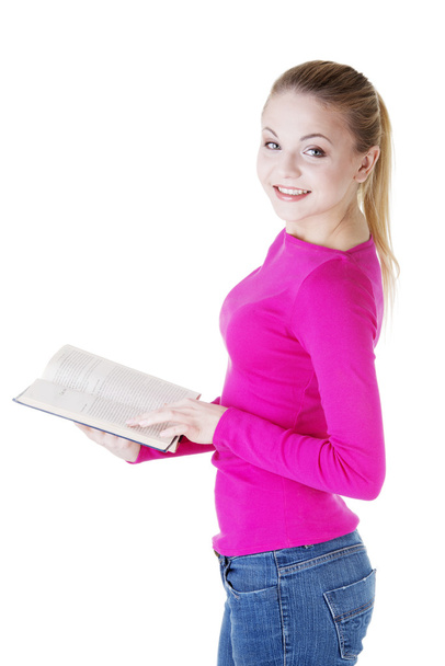 Blond woman reading book - Фото, зображення