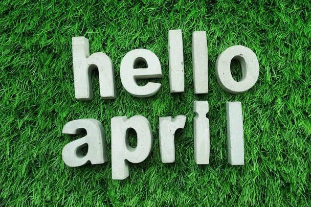 Hello April made from concrete alphabet  - Фото, изображение