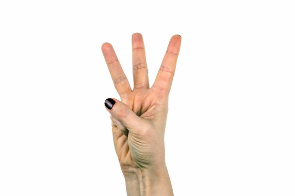 σε λευκό φόντο με τρία δάχτυλα - Φωτογραφία, εικόνα