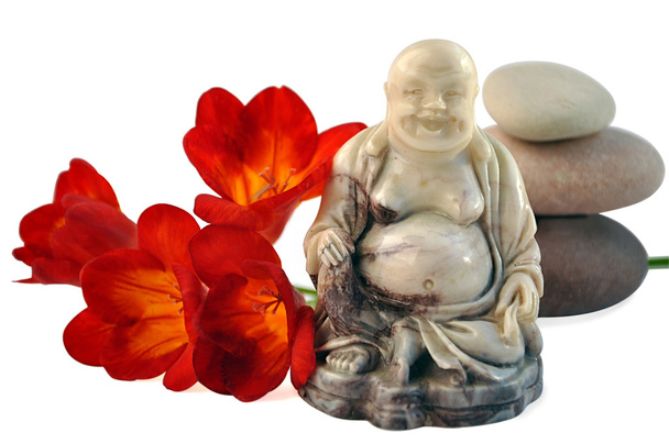 Bouddha riant, freesia et pierres
. - Photo, image