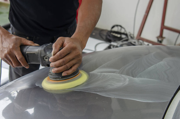 Man working for polishing, coating cars. - Photo, Image