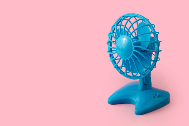 blue cooler fan on pink background  - Fotoğraf, Görsel