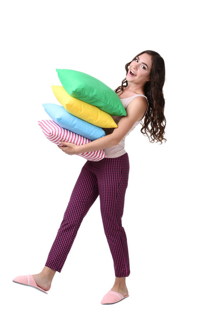 Beautiful girl holding colorful pillows isolated on white background - Φωτογραφία, εικόνα