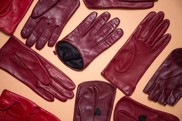 Beautiful bright gloves made of genuine leather for women - Photo, Image