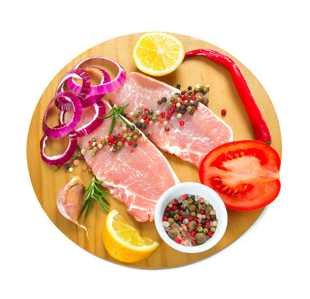 sliced raw meat and vegetables isolated on white - Φωτογραφία, εικόνα