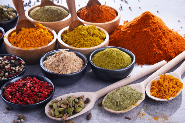 Variety of spices on kitchen table. - Fotoğraf, Görsel