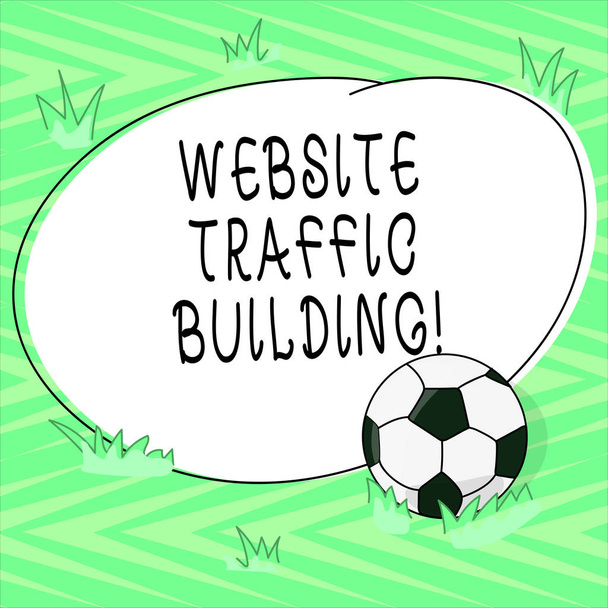 Текст знака показ веб-сайт трафік будівлі. Концептуальні фото файлів сookie маркетологів слідувати веб-користувачі футбольний м'яч трави та пусті окреслив колір фігури фото - Фото, зображення