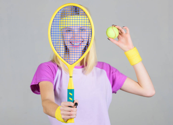 Tennis club concept. Tennis sport and entertainment. Active leisure and hobby. Girl fit slim blonde play tennis. Sport for maintaining health. Active lifestyle. Woman hold tennis racket in hand - Fotó, kép