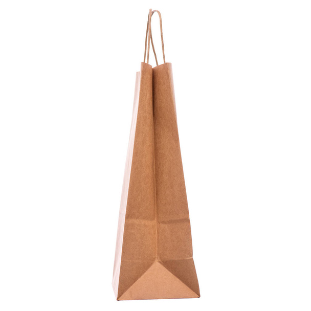 One Empty Brown Paper Bag. Recycled paper Shopping Bag isolated on white background. - Photo, Image