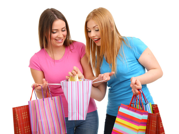 Two girl friends with shopping isolated on white - Zdjęcie, obraz