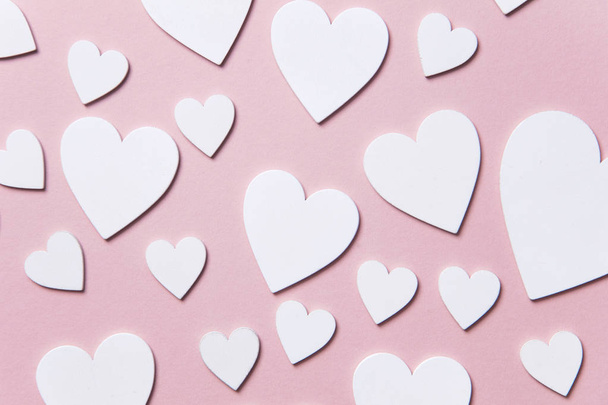 White hearts on a pastel pink background. Valentine's day, Mother's day background - Fotoğraf, Görsel