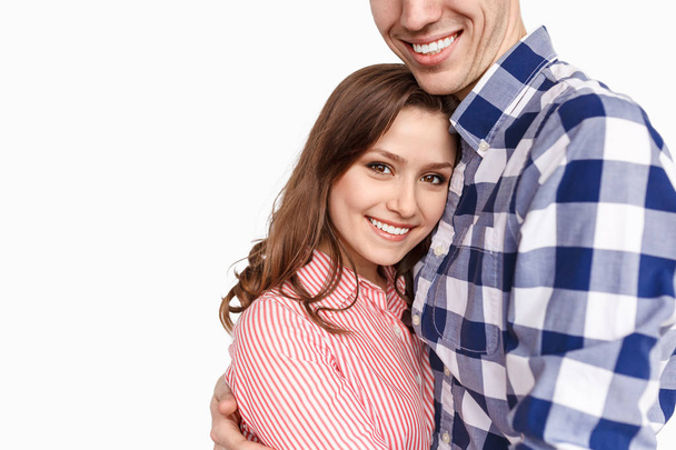 Smiling female hugging crop boyfriend - Fotó, kép
