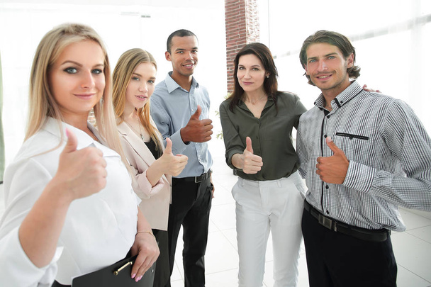 successful multinational business team showing thumb up - Φωτογραφία, εικόνα