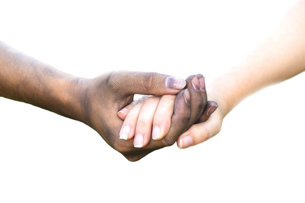 Close-up van man en vrouw handen raken samen met een vuile hand en een schone op witte achtergrond voor de dag van de Valentijnskaart van liefde concept - Foto, afbeelding