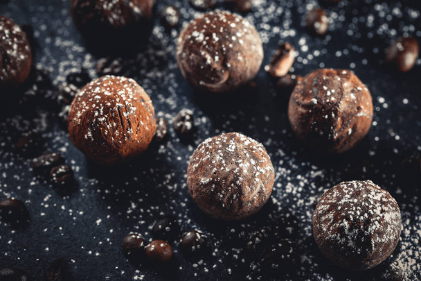 chocolate truffles on slate tray - Foto, Bild