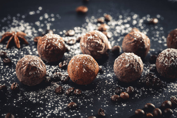 chocolate truffles on slate tray - Valokuva, kuva