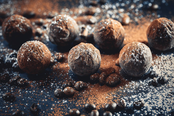 chocolate truffles on slate tray - Foto, imagen
