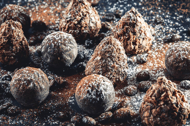 chocolate truffles on slate tray - 写真・画像