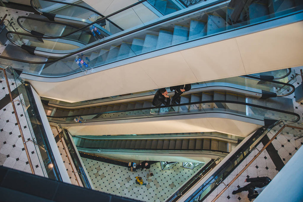 LVIV, UKRAINE - November 11, 2018 - view of modern mall with lot of escalators levels - Foto, imagen
