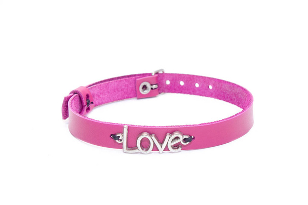 Pink leather choker on a white background. Side view - Photo, Image