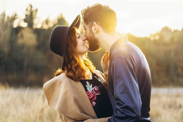 Pretty young romantic couple spend time together outdoor - Foto, Imagen