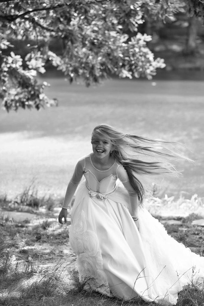 small girl in white dress outdoor - Foto, Imagem