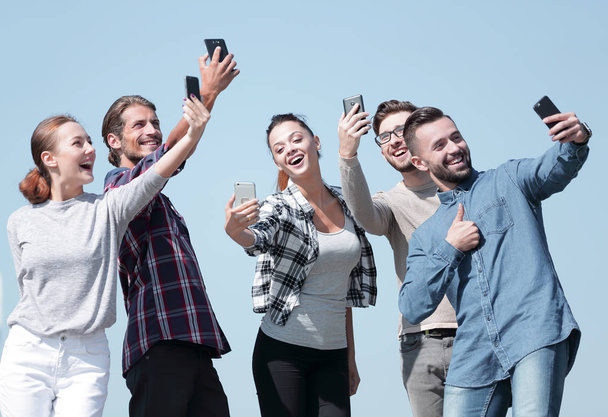 group of young people taking a selfie. - Fotó, kép