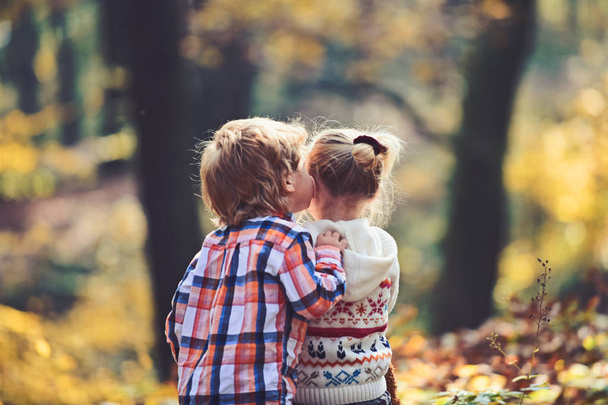 Childhood kiss, love and trust. Childhood friendship and children early development - Photo, Image