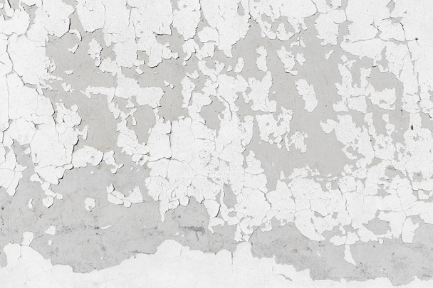 Concrete wall texture background with grey grungy stucco, white peeled paint, cracks and stains - Foto, Imagem