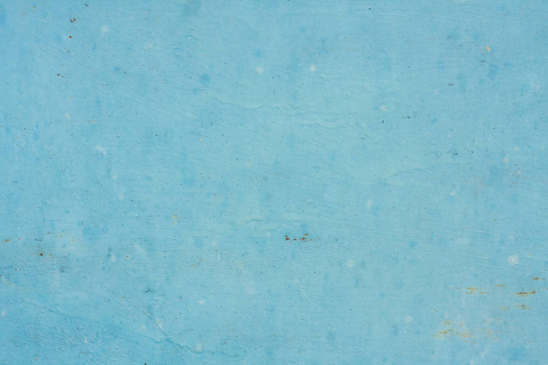 Metal texture background with pale blue worn paint and small rust stains - Foto, Imagem