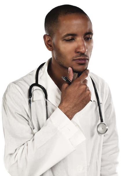 african american young doctor with hand on chin - 写真・画像