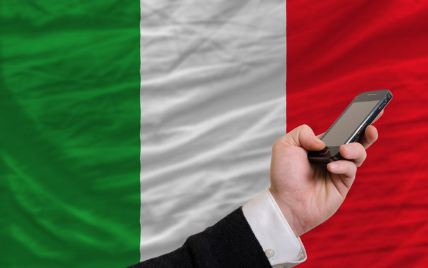 cell phone in front national flag of italy - Photo, Image